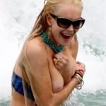 lindsay lohan tit slip